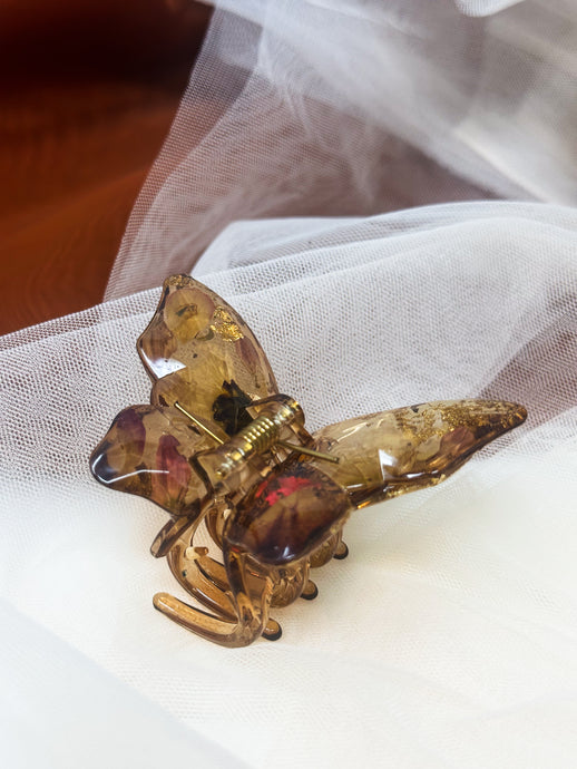 Crystal Brown Butterfly Clip Infused with Real Flowers in Resin.