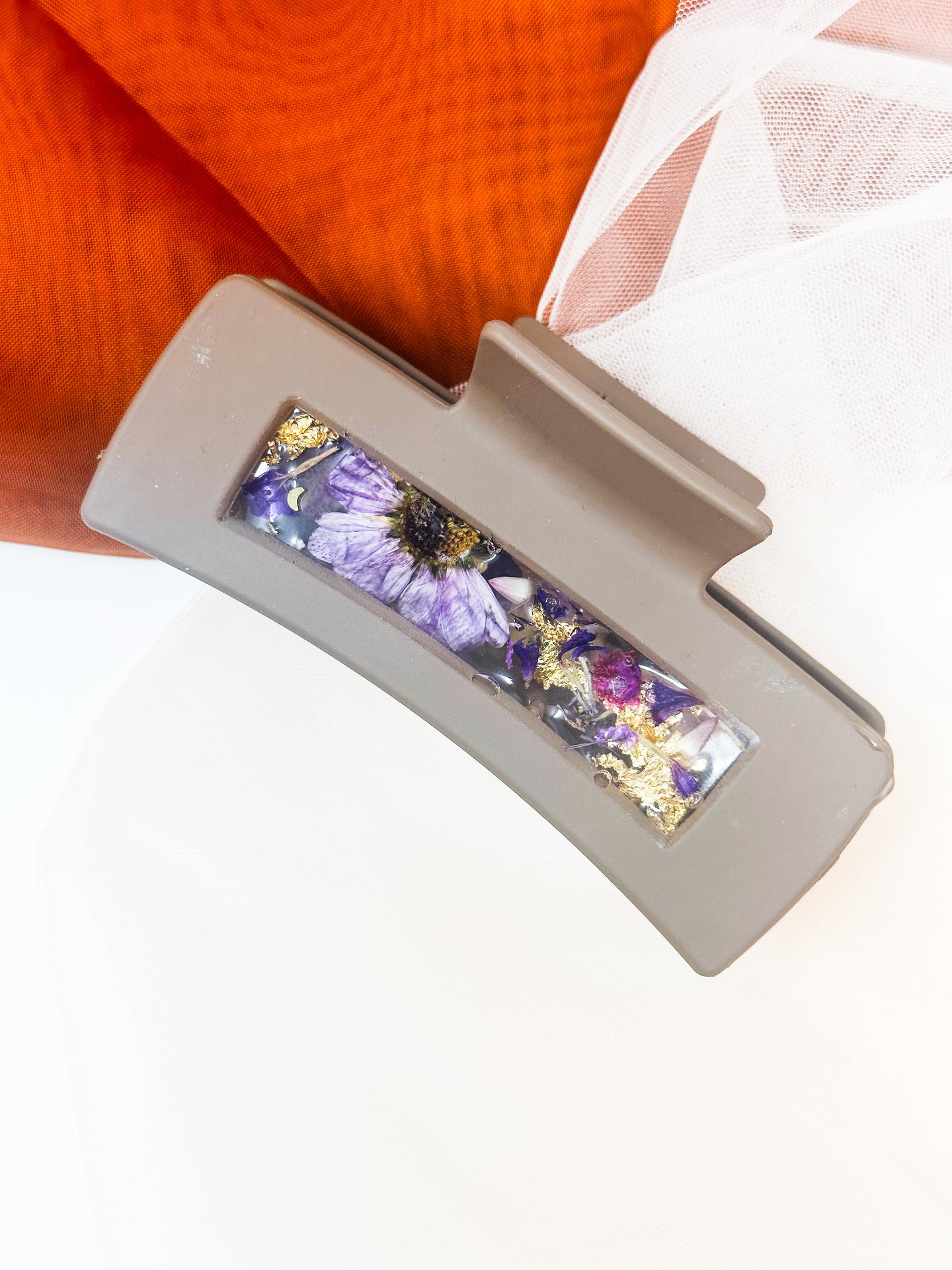 Gray-Brown Claw Clip Infused with Real Flowers in Resin.