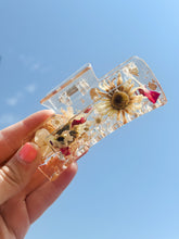 Load image into Gallery viewer, Crystal Clear Claw Clips Infused with Real Pressed Flowers Cast in Resin. MADE TO ORDER: Choose Your Own Flowers.