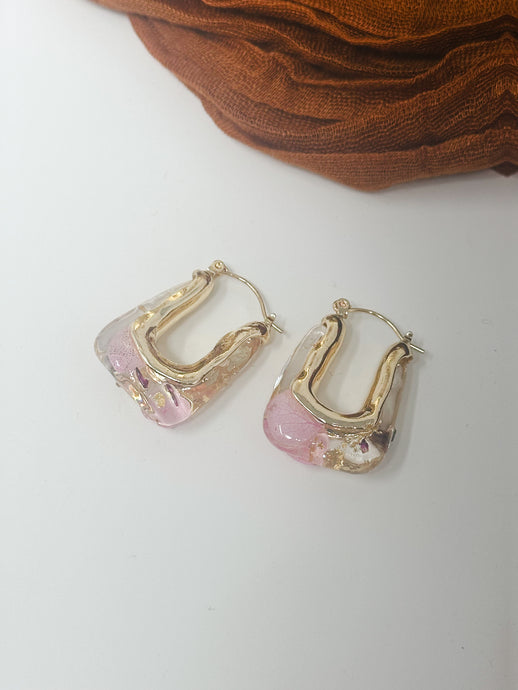 Resin hoops with real pressed pink and purple flowers inside